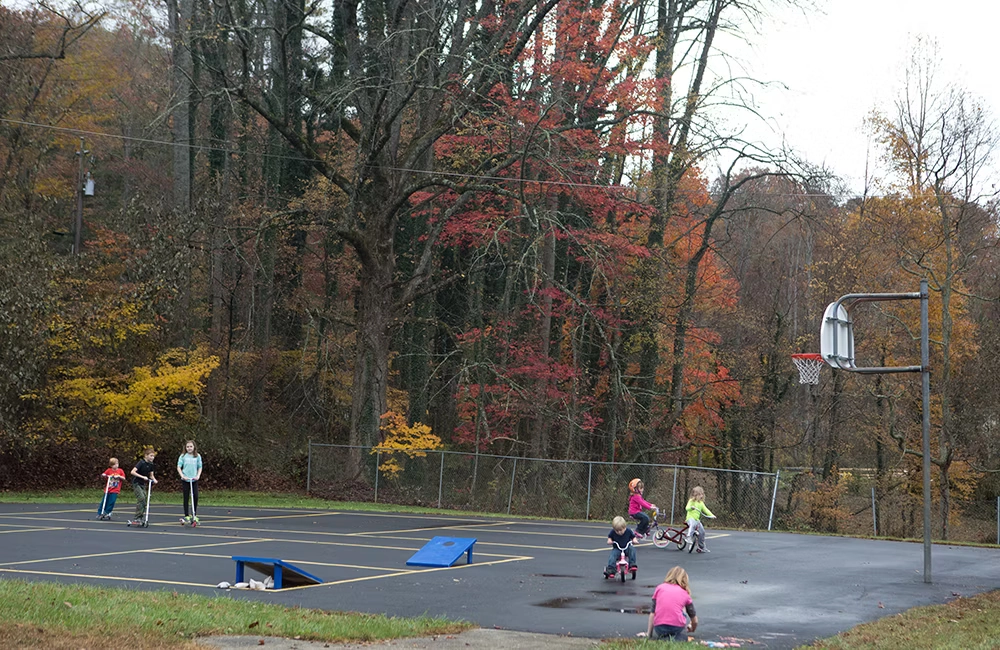 Children playing at the Balsam Community Center Playground